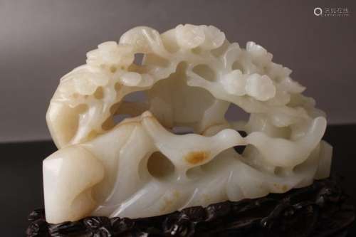 A HETIAN JADE CARVED ORNAMENT AND BASE