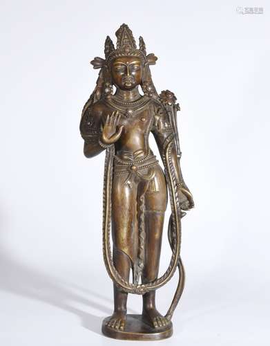 A GILT-BRONE FIGURE OF TARA