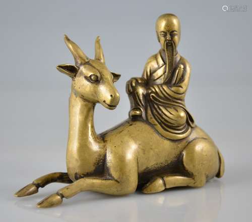 A GILT-BRONZE MAND AND DEER