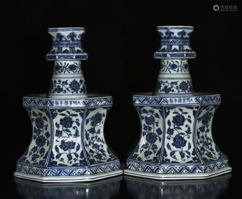 A PAIR OF BLUE AND WHITE CANDLE HOLDER