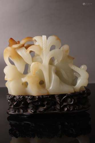 A HETIAN JADE CARVED ORNAMENT AND BASE