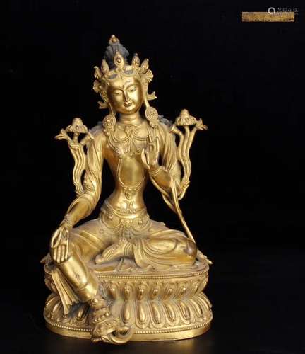 A GILT-BRONZE FIGURE OF TARA