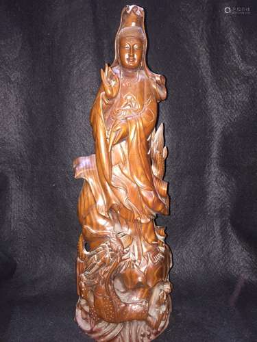 A WOODEN CARVED FIGURE OF GUANYIN