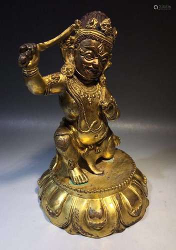 A GILT-BRONZE FIGURE OF BUDDHA