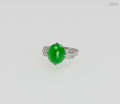 A Stunning vivid apple green Jadeite Jade diamond ring