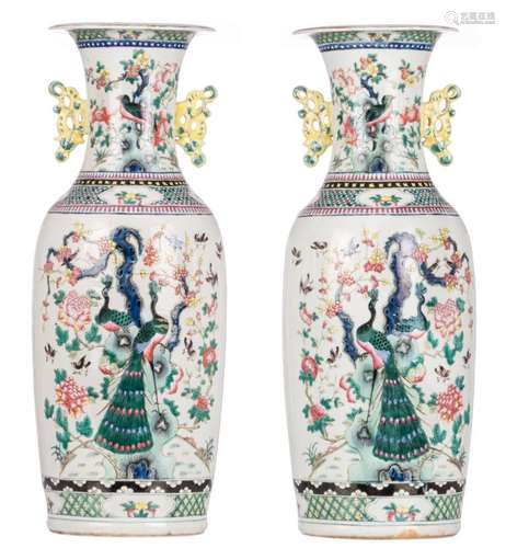 A pair of Chinese famille rose vases, one side decorated with antiquities, flower branches and a phoenix, the other side with peacocks, birds and flower branches, H 61 cm