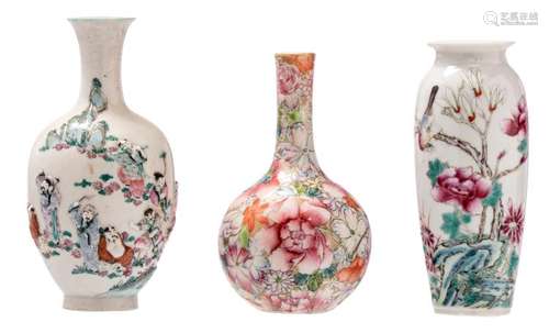 Three Chinese famille rose and mille-fleurs miniature vases, one vase relief decorated with the Eight Immortals, two vases with a Qianlong mark, H 13,5 cm