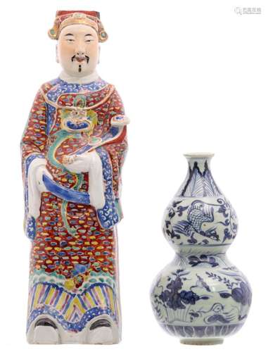 A Chinese polychrome decorated figure depicting Lu Xing, marked; added a Chinese celadon fond blue and white double gourd vase overall decorated with phoenix, flower branches and floral motifs, H 27 - 48 cm