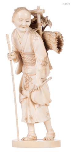 A Japanese ivory okimono depicting a wood collecting woman, late 19thC, some tinted carving, H 17,4 cm - Weight: 276g