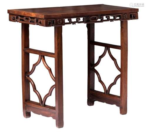 A Chinese carved hardwood side table, H 77 - W 90 - D 37 cm