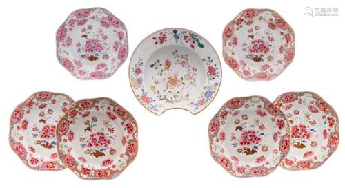 Six Chinese famille rose floral decorated dishes, 18thC; added a ditto barber's bowl, ø 23 - 27 cm