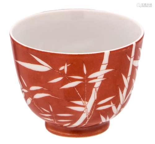 A Chinese iron red cup, decorated with bamboo branches, marked, H 7 - ø 8,5 cm