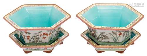 A pair of Chinese hexagonal jardinieres and plates with rocks and flower branches, marked, H 4,5 - 11 - W 25 cm