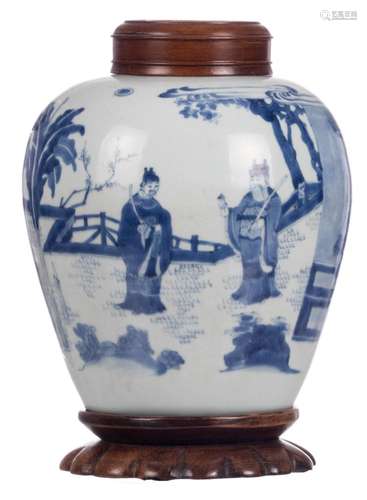 A Chinese blue and white ginger jar, overall decorated with an animated scene, with a wooden cover and on a matching wooden stand, H 26 cm (without base) - 31 cm (with base)