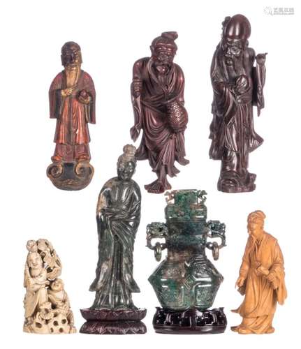 A various of seven Chinese carvings, wood, stone and ivory, two with wooden base, 19th and 20thC, H 13 - 24,5 cm - Weight: about 248g