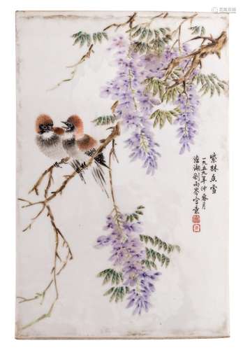 A Chinese polychrome decorated plaque with birds on flower branches and calligraphic texts, marked, in a wooden frame, H 37,5 - W 25 cm (without mount) - H 43,5 - W 31 cm (with mount)