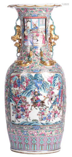 A Chinese famille rose floral and relief decorated vase, the roundels with court scenes and warriors, 19thC, H 89 cm