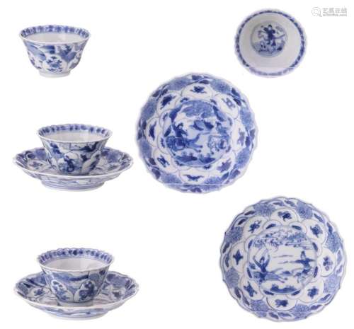 Four Chinese blue and white floral decorated cups and saucers, the roundels with a warrior scene, Kangxi and period, H 2 - 4 - ø 6,5 - 11 cm