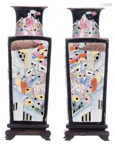 A pair of Chinese double walled quadrangular polychrome and openwork decorated vases with figures in pavilions, with a Qianlong mark, on a matching wooden base, H 33 (without base) - 36,5 cm (with base)