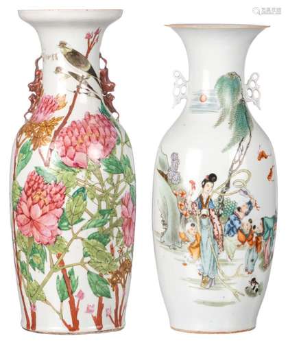 A Chinese polychrome decorated vase with a lady and playing children in a garden and calligraphic texts; added a ditto famille rose vase, decorated with birds and flower branches, H 57,5 - 60,5 cm