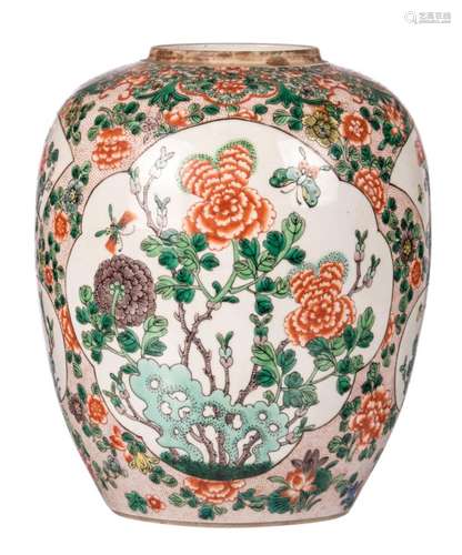 A Chinese famille verte floral decorated pot and cover, the roundels with flower branches and butterflies, marked, H 31 (without cover) - 39,5 cm (with cover)