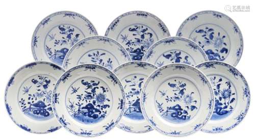 A set of Chinese blue and white 'rocher percé' decorated dishes, 18thC, ø 23,5 - 24 cm