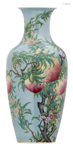 A Chinese light blue ground famille rose decorated vase with peaches and blossoms, H 46 cm