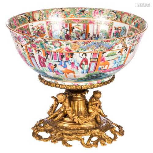 A Chinese famille rose Canton bowl, overall decorated with court scenes, 19thC, on a gilt bronze mount, H 13 (without mount) - 27 (with mount) - ø 33 cm