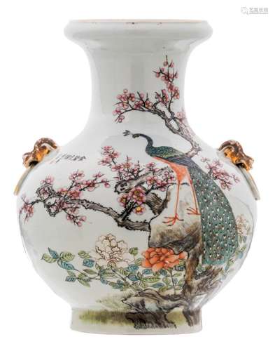 A Chinese famille rose baluster shaped vase, decorated with a peacock on a rock, flower branches and calligraphic texts, marked, with certificate, H 34 cm