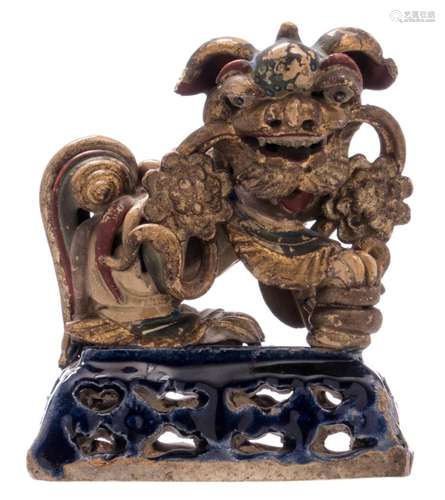 A Japanese polychrome glazed stoneware Shishi, gilt and polychrome decorated, marked, 19thC, H 16 - W 14 cm