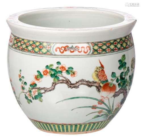 A Chinese famille verte jardiniere, decorated with birds, butterflies and flower branches, H 25 cm