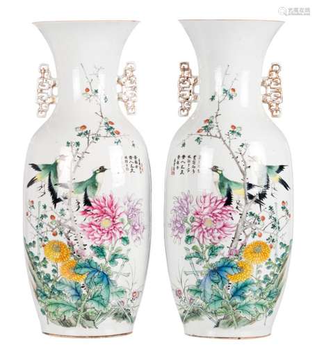 A pair of Chinese famille rose vases, both sides decorated with birds on flower branches and calligraphic texts, signed, H 57,5 cm