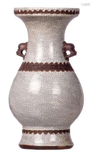 A Chinese stoneware crackleware and relief decorated baluster shaped vase, about 1900, H 39 cm