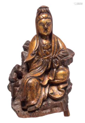 A Chinese gilt and polychrome lacquered wooden seated Guanyin, H 29 cm