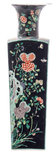 A Chinese famille noire quadrangular vase with various blossoms and flower branches, with a symbol mark, H 48,5 cm