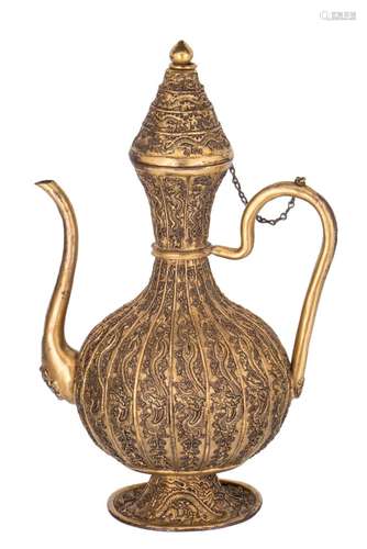 A Chinese gilt brass dragon relief decorated jug with a Qianlong mark, H 22,5 cm