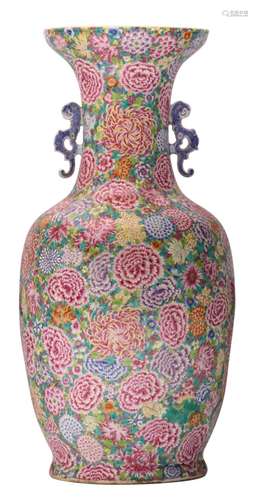 A large Chinese mille-fleurs decorated vase, with dragon shaped handles, with a Qianlong mark, H 95 cm