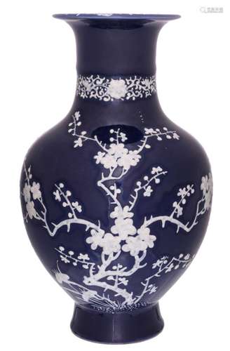 A Chinese blue ground overall decorated vase with prunus blossoms, Yongzheng marked, H 30 cm