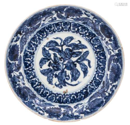 A Chinese blue and white floral decorated plate with pomegranates and flowers, H 6 - ø 32 cm