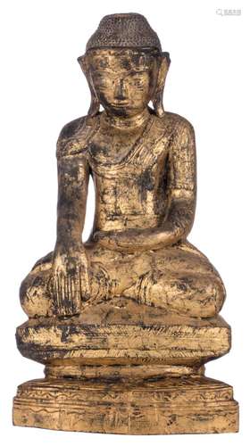 An Oriental gilt lacquered wooden seated Buddha, H 50 cm