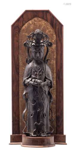 A Chinese bronze figure depicting a Guanyin, Ming, on a wooden base, H 34 (without base) - 43 cm (with base)