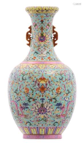 A Chinese turquoise ground famille rose vase, floral decorated with mythological animals and symbols of prosperity, with a Jiaqing mark, H 34 cm