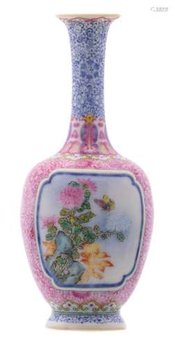 A Chinese famille rose miniature bottle vase, floral decorated, the roundels with a rock, a butterfly and flower branches, with a Qianlong mark, H 14 cm