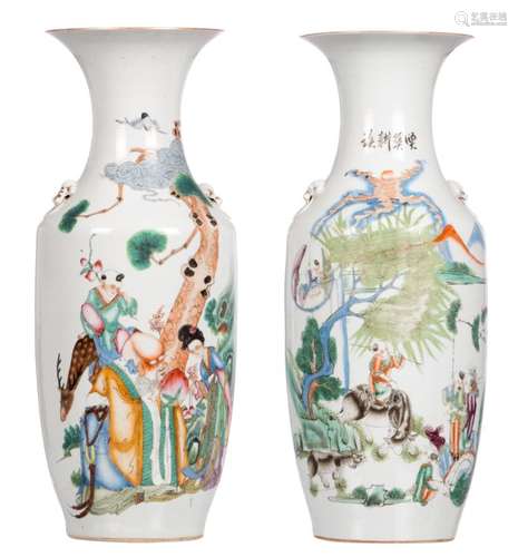 Two Chinese polychrome decorated vases, with animated scenes and calligraphic texts, H 58 cm