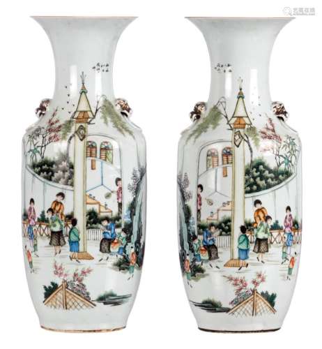 A pair of polychrome decorated vases, with an animated scene and calligraphic texts, H 58 cm