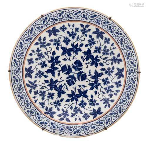 A Chinese ground plate, blue and white decorated with floral motifs, marked Guangxu and period, H 5 - ø 34 cm