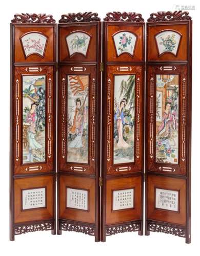 A Chinese four panel carved wooden screen, the famille rose plaques decorated with the four seasons, floral motifs and calligraphic texts, H 197 - B 180 cm