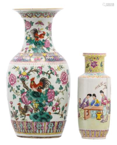 A Chinese famille rose vase, decorated with roosters, flower branches and butterflies; added, a ditto rouleau vase, decorated with a galant garden scene and a calligraphic text, marked, H 30 - 45 cm