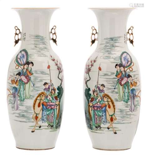 A pair of Chinese polychrome decorated vases with an animated scene and calligraphic texts, H 58 cm