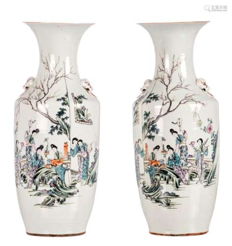 A pair of polychrome decorated Chinese vases, with an elegant garden scene and calligraphic texts, H 57,5 cm